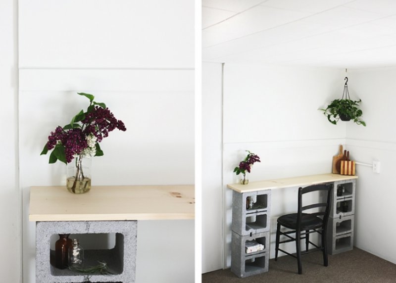 Use some cinder blocks and wood to create a perfect work space.