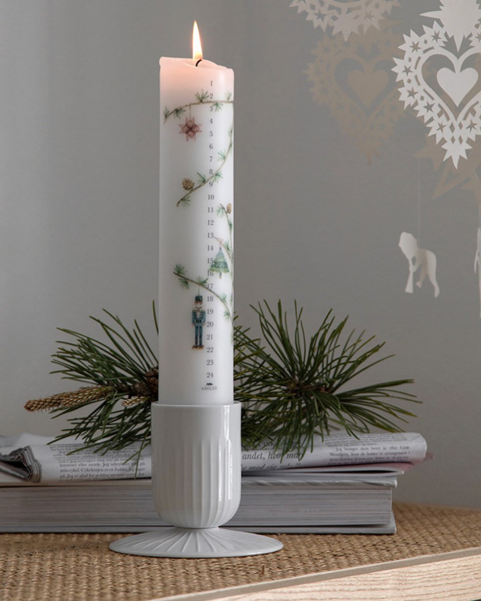 Candle with illustrations from fantastic illustrator.