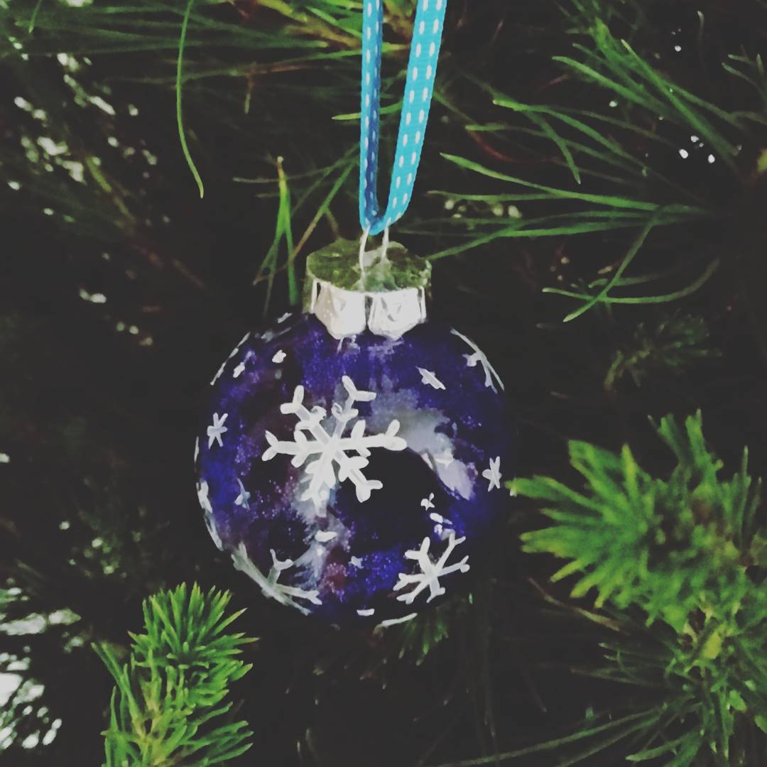 Snowflake painted Ornament.