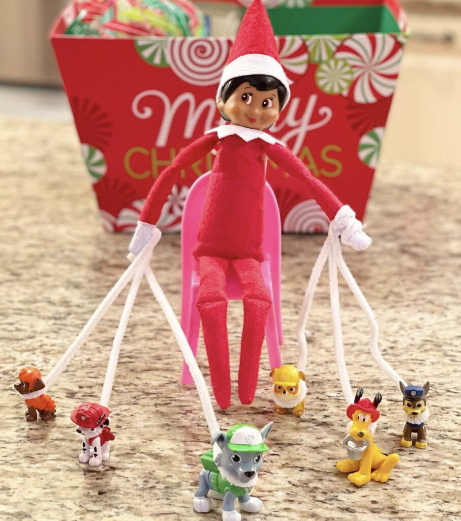 Elf takes the dogs for a walk