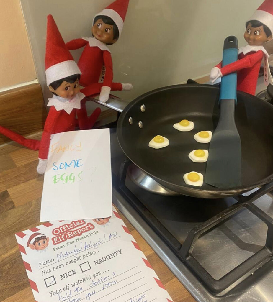 Elves make breakfast with candy eggs