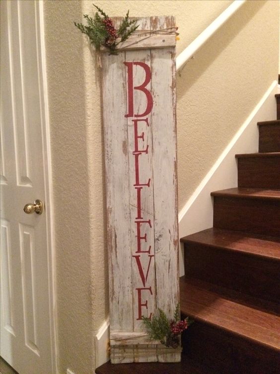 Believe pallet sign board at entrance