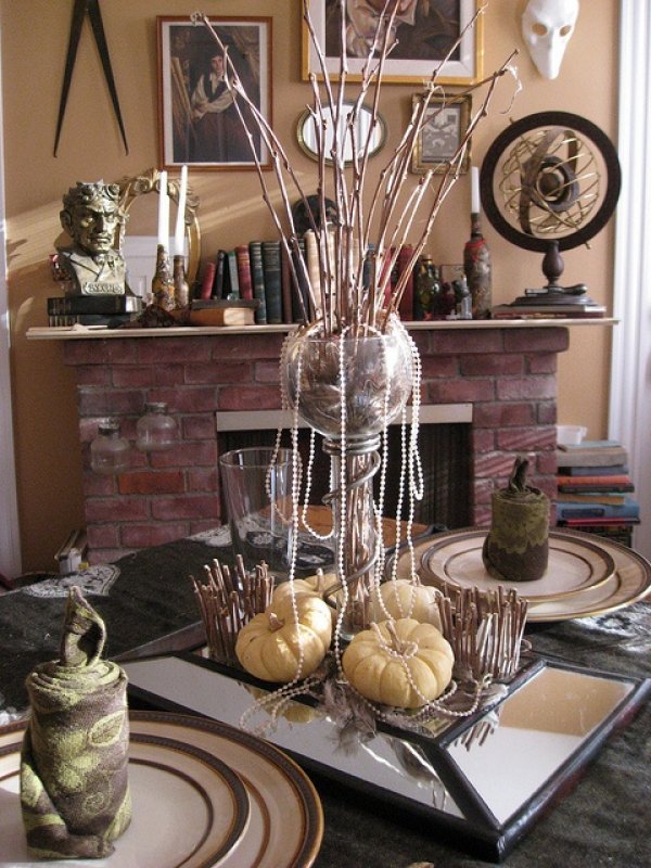 Halloween tree with pumpkin as centerpiece