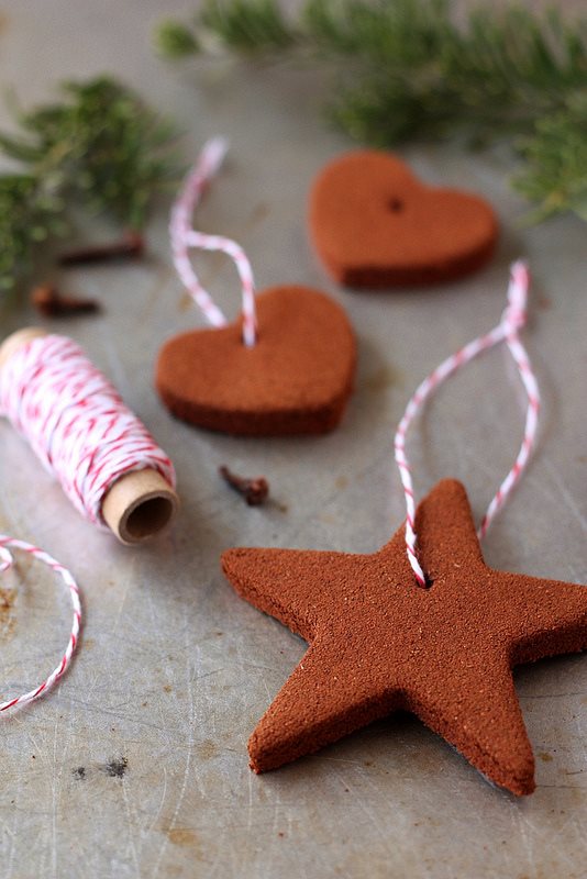 Add extra spice by ground cloves into cinnamon ornament