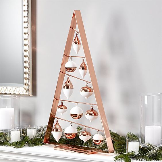 Alternative Christmas tree with white and copper ornaments.