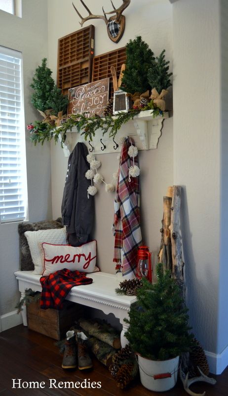 Amazing lodge-style entryway Christmas decoration idea.