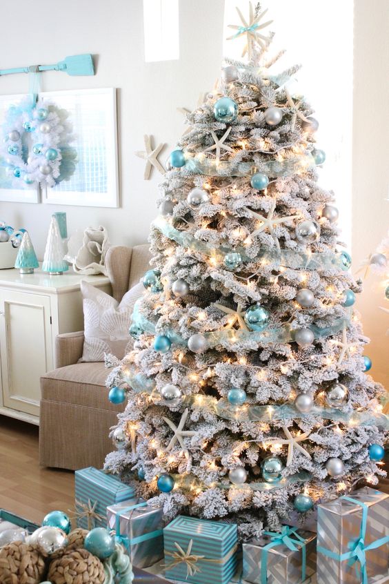 Calm blue coastal theme Christmas tree decoration idea.