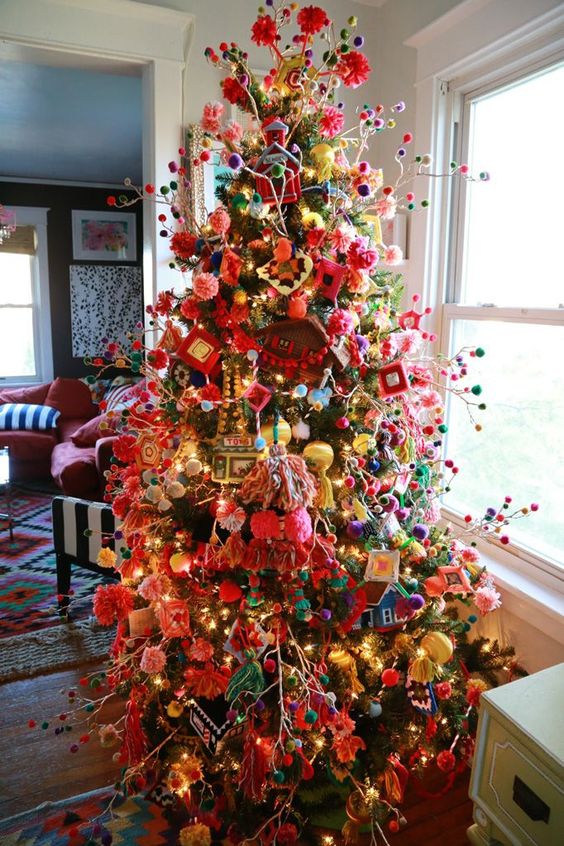 Colorful boho chic Granny-styled tree with pompoms.