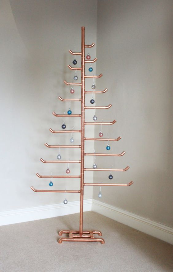 Fabulous copper tree decorated with colorful ornaments.