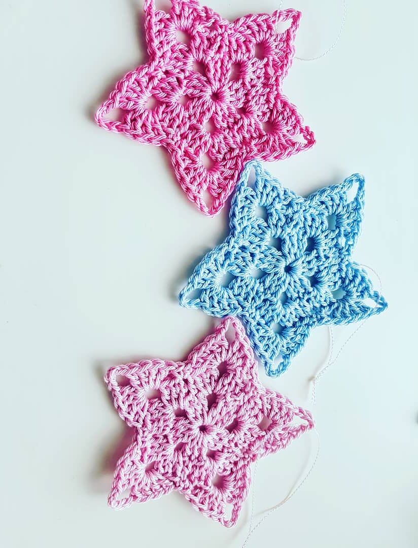 Handmade crochet blue and pink star tree ornaments