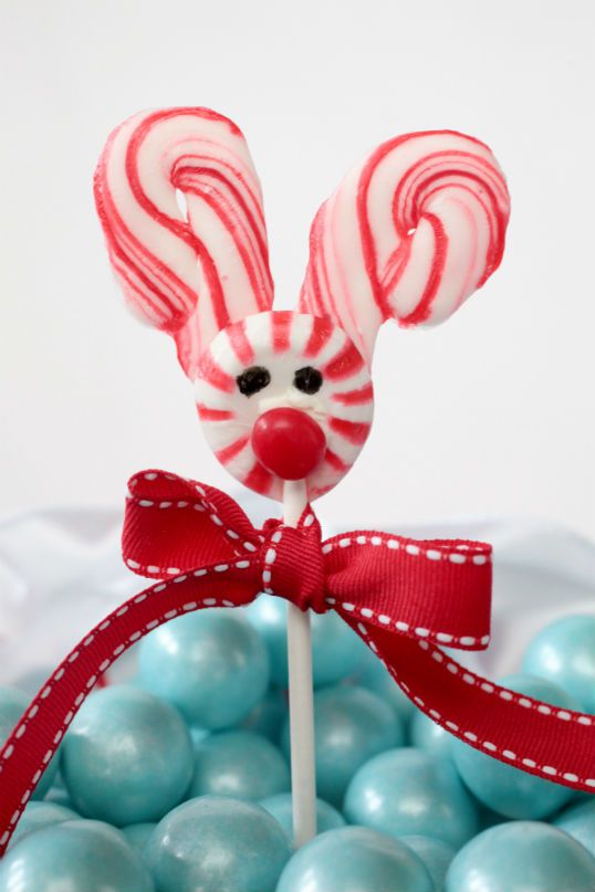 Melted candy cane and peppermint lollipops for kids' party.