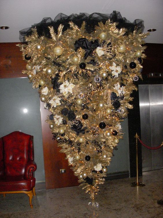 Rocking golden and black upside-down Christmas tree.