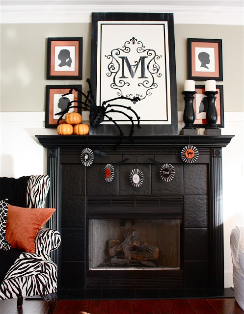 A gothic Halloween mantel with cobwebs