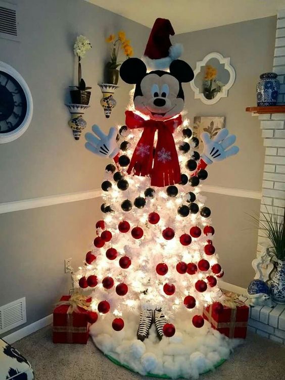 Awesome white Mickey Mouse Christmas tree with red and black balls.