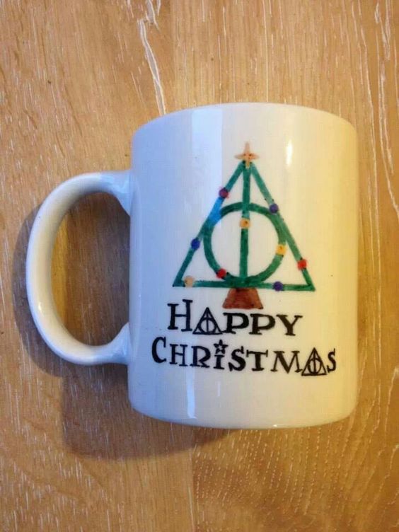 Christmas mug with Death Hallow sign. 