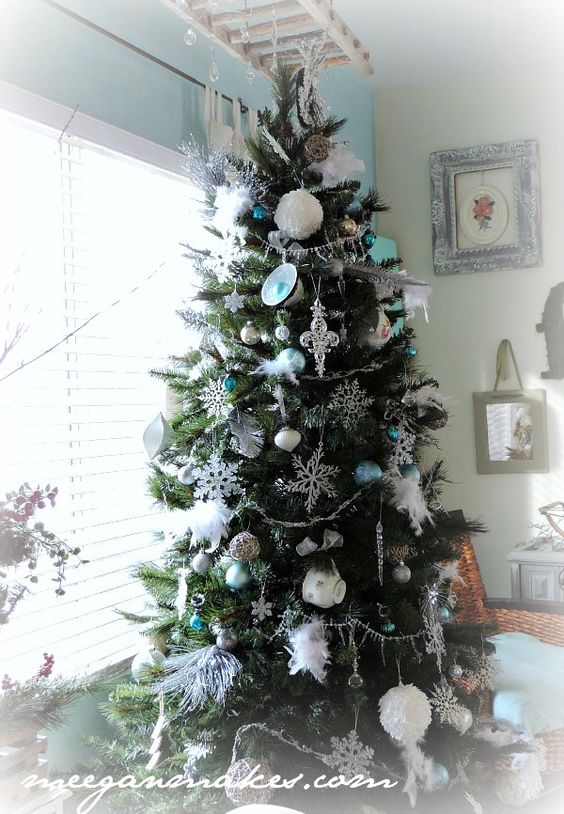 Dashing Christmas tree decoration with white balls, cup and silver snowflakes