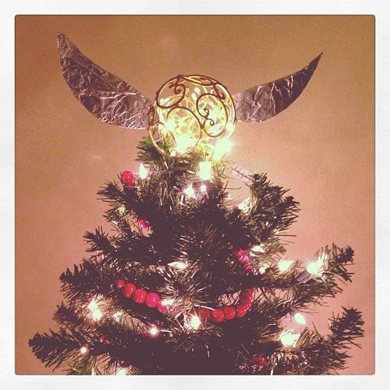 Dashing golden snitch Christmas tree topper. 