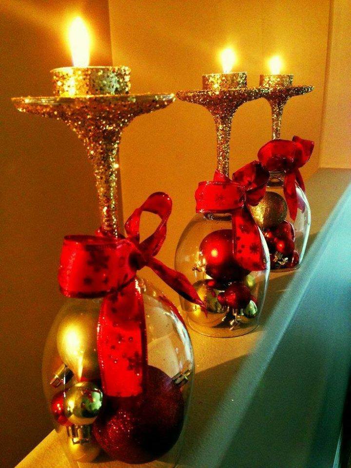 Lovely glitter wine glasses with ornament, ribbon and tea lights