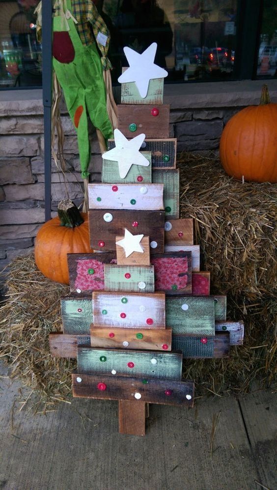 A pretty reclaimed wooden tree decorated with buttons