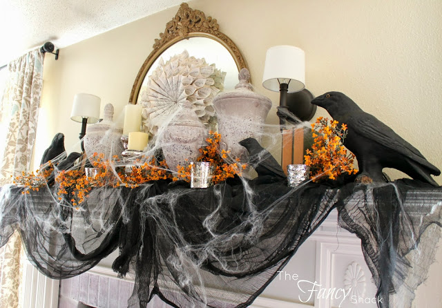 Vintage-style Halloween mantel decor with crows