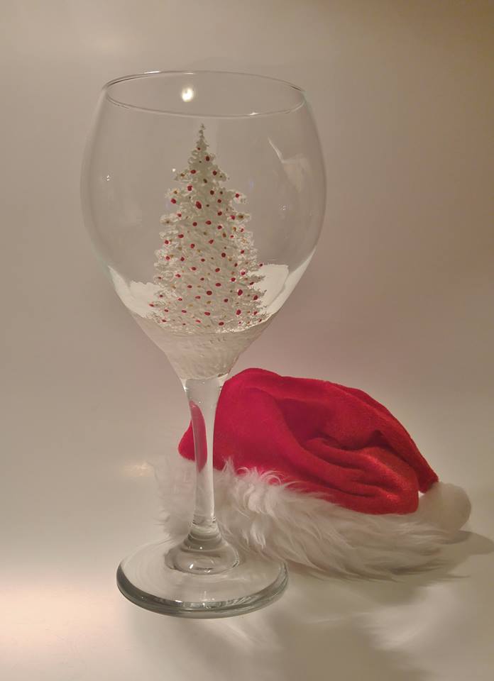 White Christmas tree with red ornament painted on wine glass