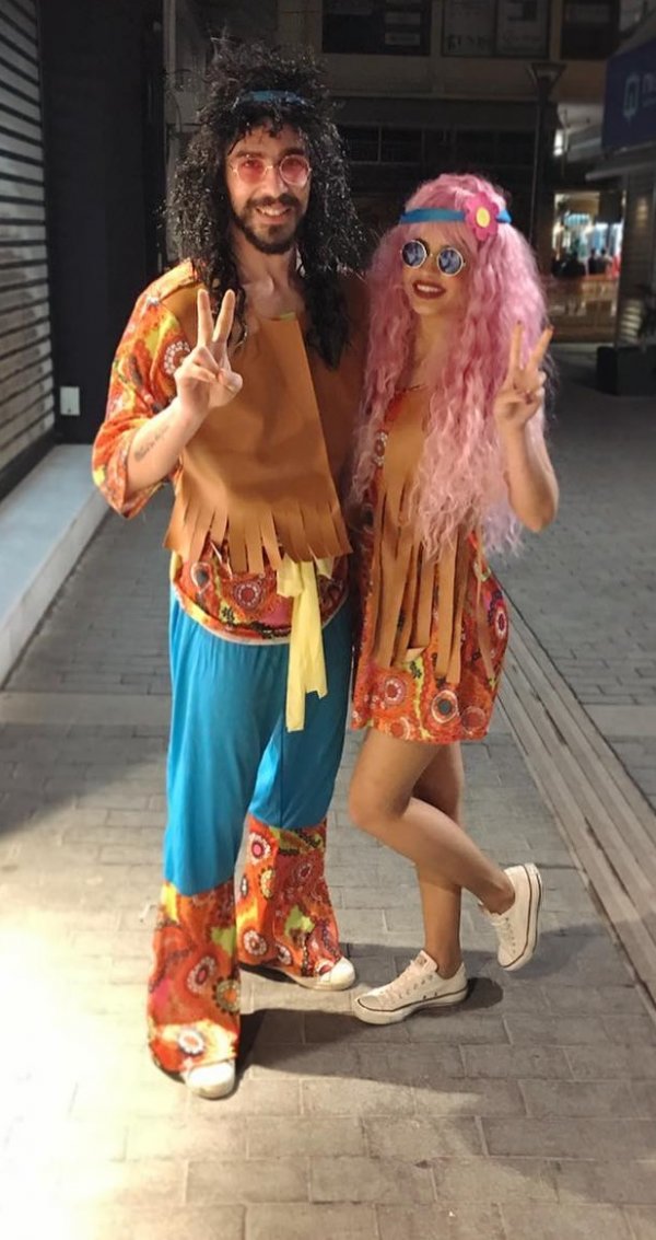 Hippie-style Halloween couple costume.