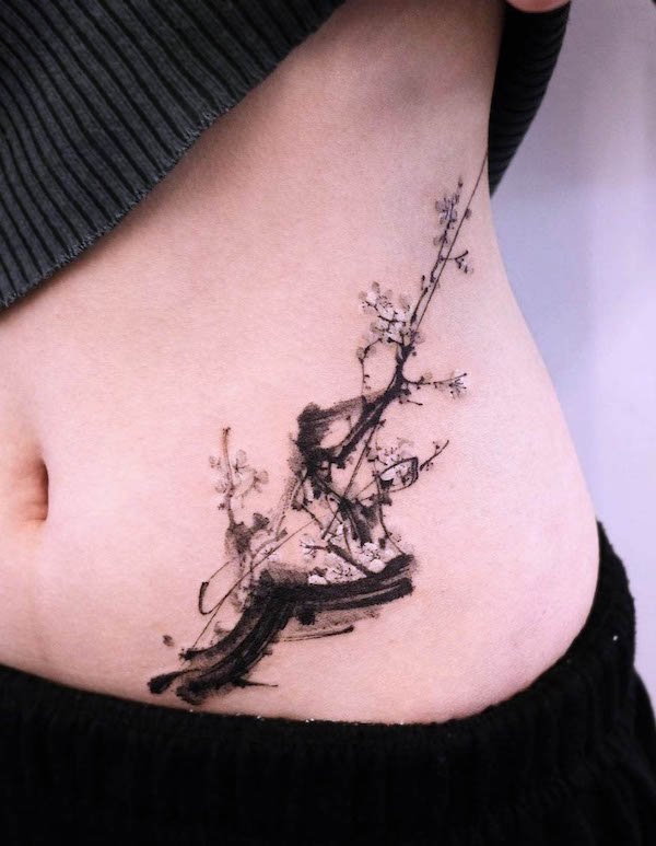 Black cherry blossom waist tattoo