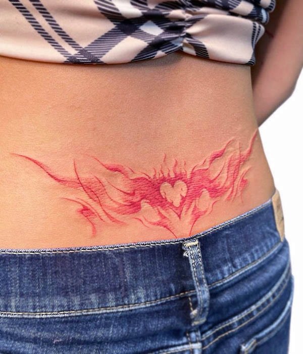 Burning heart waist tattoo