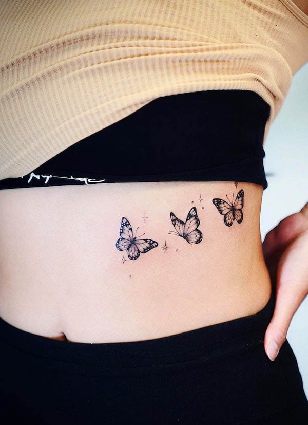 Butterfly waist tattoo