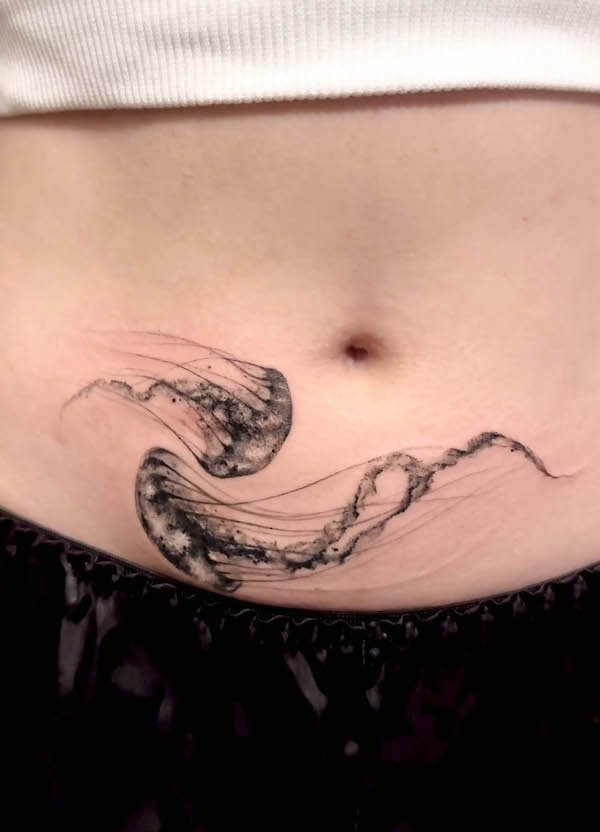 Cover-up jellyfish tummy tuck tattoo
