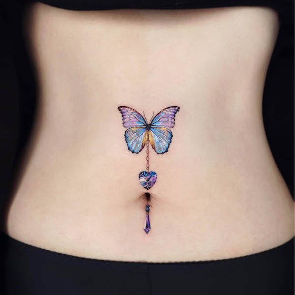 Cute butterfly tummy tattoo