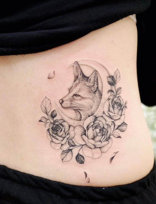 Fox and moon waist tattoo