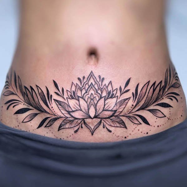 Lotus tummy tuck tattoo