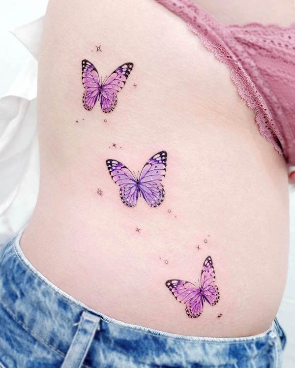 Pink and purple butterfly tattoo