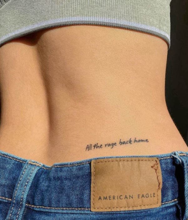 Quote waistline tattoo