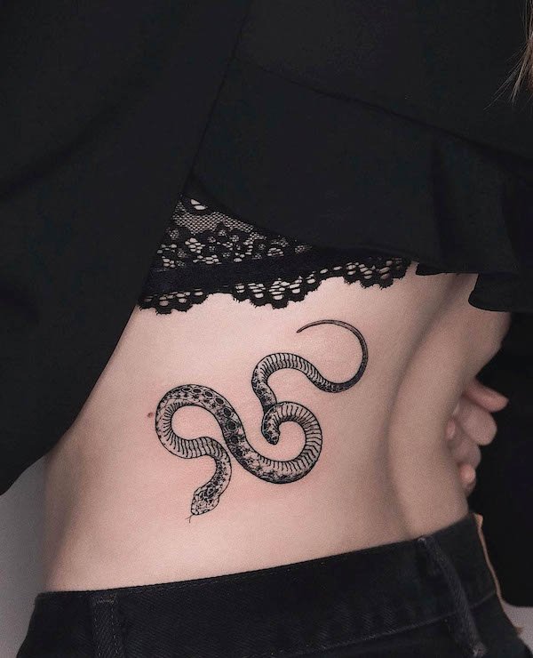 Snake side waist tattoo