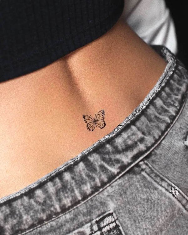 Tiny butterfly waist tattoo