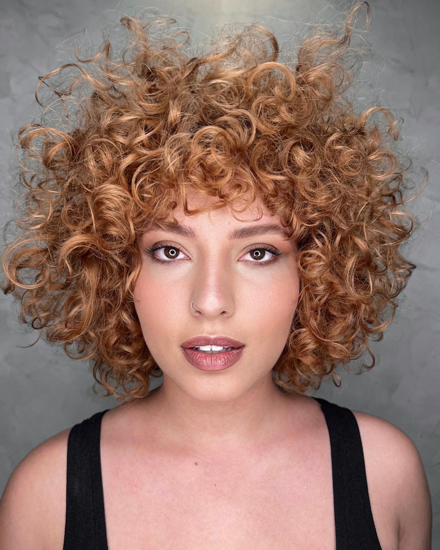 Messy Curly Bob with Bangs